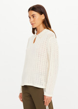 THE UPSIDE women's cream organic cotton Frederica Knit Top is designed for a relaxed fit with an open geometric knit construction, collared neckline and abalone shell button detailing. Made for lifestyle.