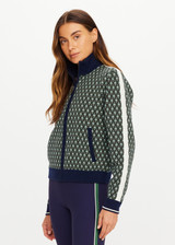 THE UPSIDE women's Viva Margot Knit Jacket is a regular fit, featuring a geo jacquard knit design, contrast stripe detailing and front patch pockets. Made for lifestyle.