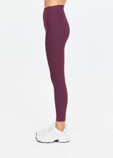 THE UPSIDE women's plum Pele 25inch Legging is designed for a supportive and comfortable fit and features a high rise waist, recycled rib fabrication and clean tonal finish. Made for yoga and pilates.