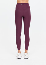THE UPSIDE women's plum Pele 25inch Legging is designed for a supportive and comfortable fit and features a high rise waist, recycled rib fabrication and clean tonal finish. Made for yoga and pilates.