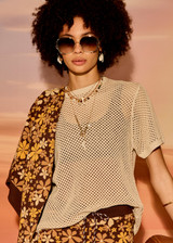THE UPSIDE women's natural organic cotton Knit Casey Tee offers a relaxed fit and features an open knit construction and ribbed trims. Made for lifestyle.