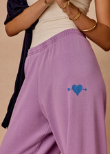THE UPSIDE women's violet organic cotton Soul Cal Wide Leg Track Pant is designed for a relaxed fit, featuring a mid rise waist and wide leg silhouette. Made for lifestyle.