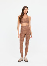 THE UPSIDE women’s leopard recycled peached Javan 28inch High Rise Legging is designed for a soft and supportive fit and features a high rise waist. Made for yoga and pilates.