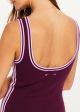 THE UPSIDE women's purple organic cotton blend Lori Knit Mini Dress is a true-to-size style featuring a scoop neckline, contrast side stripes and an embroidered logo. Made for tennis.