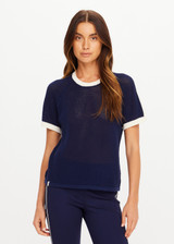 THE UPSIDE women’s navy 100% organic cotton Fenway Jordan Knit Tee offers a relaxed fit and features an open knit construction, contrast sleeve stripe detailing and ribbed trims. Made for lifestyle.