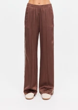 THE UPSIDE women's brown Marnie Silk Wide Leg Pant is true to size with high-rise fit, elasticated waistband, and cream side seam bindings. Made for lifestyle.