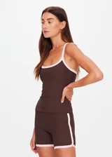 THE UPSIDE women's chocolate Rhythm Caleb Tank Top features a scooped front neckline with t-bar back and removable cups in our recycled rib fabrication. Made for yoga and pilates.
