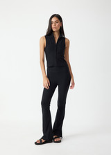 THE UPSIDE women's black Divina Florence Flare Pant is mid-rise and features a foldover waistband and side splits at hem in cotton modal fabrication. Made for lifestyle.