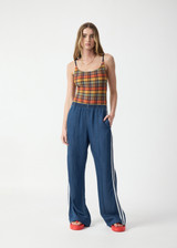 THE UPSIDE women's blue lyocell Lykke Marnie Wide Leg Pant is designed for a high-rise fit and features an elasticated waistband and cream binds down the side seams. Made for lifestyle.