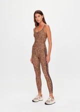 THE UPSIDE women's animal Panthera 25 Inch Midi Pant is designed for a mid-rise fit and features navy contrast binds down the side seams and a blue elastic drawcord. Made for yoga and pilates.