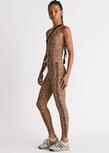THE UPSIDE women's animal Panthera 25 Inch Midi Pant is designed for a mid-rise fit and features navy contrast binds down the side seams and a blue elastic drawcord. Made for yoga and pilates.
