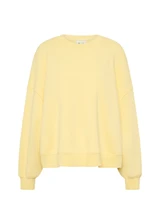 THE UPSIDE women's yellow organic cotton Paloma Crew is designed for a boxy fit and features a drop shoulder and ribbed neckline, hem and cuffs. Made for lifestyle.