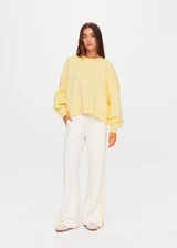 THE UPSIDE women's yellow organic cotton Paloma Crew is designed for a boxy fit and features a drop shoulder and ribbed neckline, hem and cuffs. Made for lifestyle.