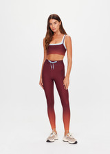 THE UPSIDE women's red recycled peached Maya Sal Double Layer Bra is mid coverage and features a scooped neckline, elasticated underbust and removable cups. Made for yoga and pilates.