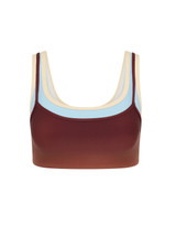 THE UPSIDE women's red recycled peached Maya Sal Double Layer Bra is mid coverage and features a scooped neckline, elasticated underbust and removable cups. Made for yoga and pilates.