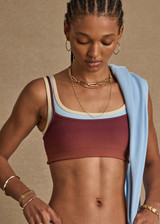 THE UPSIDE women's red recycled peached Maya Sal Double Layer Bra is mid coverage and features a scooped neckline, elasticated underbust and removable cups. Made for yoga and pilates.