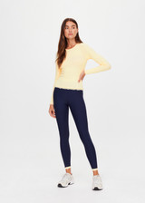THE UPSIDE women's yellow organic cotton Arlo Pointelle Long Sleeve Top is a soft and comfortable fit and features a crew neck and ruffle lace edge tonal trim. Made for lifestyle.