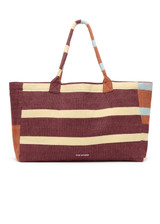THE UPSIDE women's stripe cotton Del Sol Rhodes Tote Bag is made from a lightweight, loomed fabric and features a lilac lining and stripes in burgundy, lemon, blue and rust. Made for lifestyle.