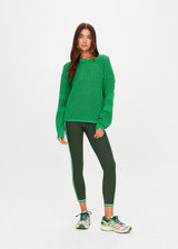 THE UPSIDE women's green organic cotton Fenway Sebastian Knit Crew is designed for a relaxed fit and features an open knit construction with The Upside logo knitted on back. Made for lifestyle.