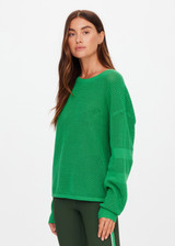 THE UPSIDE women's green organic cotton Fenway Sebastian Knit Crew is designed for a relaxed fit and features an open knit construction with The Upside logo knitted on back. Made for lifestyle.