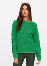 THE UPSIDE women's green organic cotton Fenway Sebastian Knit Crew is designed for a relaxed fit and features an open knit construction with The Upside logo knitted on back. Made for lifestyle.