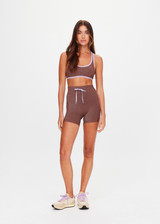 THE UPSIDE women's espresso metallic Galaxia Danita Racerback Bra is designed for a supportive fit and features a scoop neckline, racerback and removable cups. Made for yoga and pilates.