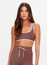 THE UPSIDE women's espresso metallic Galaxia Danita Racerback Bra is designed for a supportive fit and features a scoop neckline, racerback and removable cups. Made for yoga and pilates.