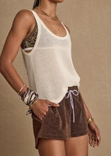 THE UPSIDE women's chocolate metallic Galaxia Marcella Short is a mid to low rise fit and features an elasticated waistband, a purple paracord drawcord and side seam pockets. Made for lifestyle.