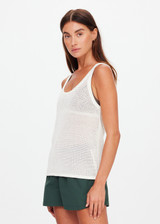 THE UPSIDE women's cream organic cotton La Paz Riva Knit Tank is a basketball tank style featuring an open knit construction and a knitted palm tree detail on back. Made for lifestyle.