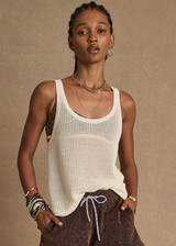 THE UPSIDE women's cream organic cotton La Paz Riva Knit Tank is a basketball tank style featuring an open knit construction and a knitted palm tree detail on back. Made for lifestyle.