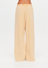 THE UPSIDE women's yellow Soho Tokio Wide Leg Pant is designed for a relaxed fit and features an elasticated waistband, front pockets and embroidered arrow logo. Made for everyday.