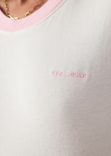 THE UPSIDE women's pink organic cotton Jacob Tee is an oversized fit and features contrast pink binds on sleeves and a small embroidered logo on front chest. Made for lifestyle.