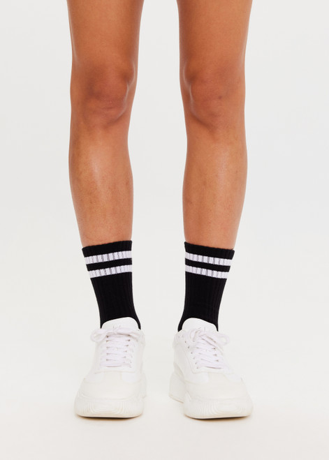 THE UPSIDE Arrow 2 Pack Sock in Black with white jacquard stripes and arrow and white with black jacquard stripes and arrow.