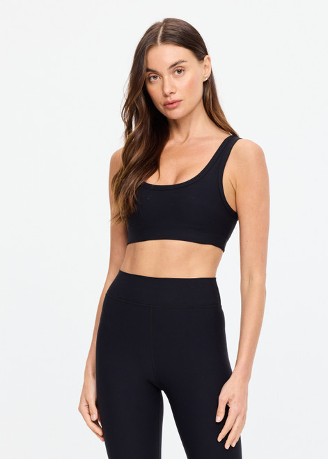 THE UPSIDE women's black mid coverage Peached Harley Bra features removable bust cups, scoop front and neck bra. This sports bra is constructed with breathable, moisture-wicking fabrication.