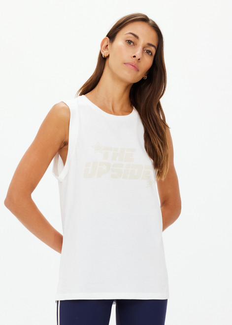 THE UPSIDE women's white organic cotton Stardust Jeet Tank Top is designed for a relaxed fit and features printed star logo on front. Made for lifestyle.