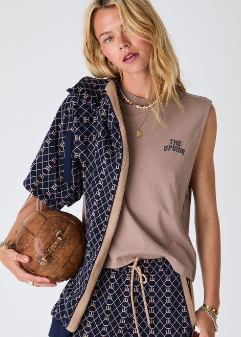 THE UPSIDE women's mocha organic cotton Dawson Tank has a relaxed fit with a soft ribbed neckline and navy varsity logo at chest. Made for everyday wear.