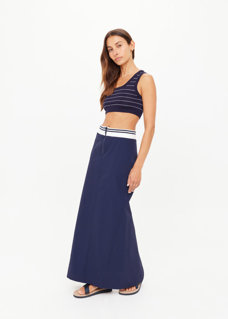 THE UPSIDE women’s navy Astra Zora Midi Skirt features a white and navy striped ribbed waistband with a centre back split. Made for lifestyle.