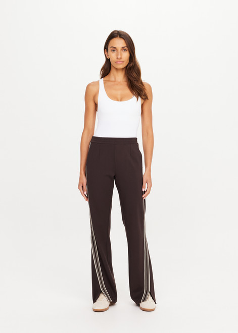 THE UPSIDE women's brown lenzing viscose Petra Flare Pant features splits at hem bottoms and side seam pockets. Made for lifestyle.