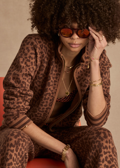 THE UPSIDE women's leopard organic cotton Malawi Margot Knit Jacket offers a regular fit and features front pockets and a ribbed waistband. Made for lifestyle.