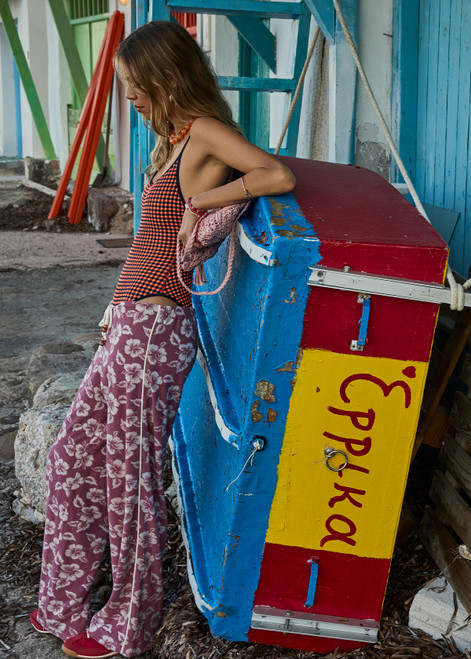 THE UPSIDE women's pink floral organic cotton Lahaina Charli Drawstring Pant has a low-rise straight leg fit with a soft elasticated waistband with drawcord. Perfect for everyday or holiday.