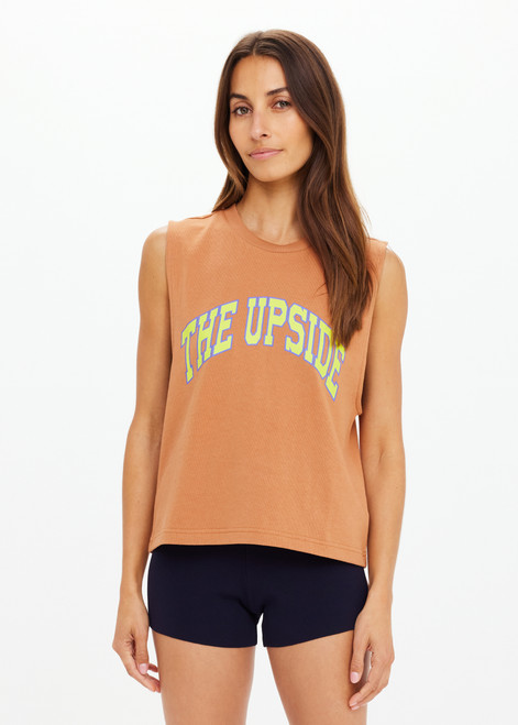 THE UPSIDE women's orange organic cotton Dawson Tank has a relaxed fit, mid length, and a printed lime varsity logo on the front chest. Made for lifestyle.
