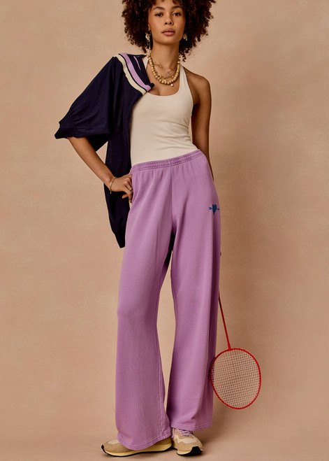 THE UPSIDE women's violet organic cotton Soul Cal Wide Leg Track Pant is designed for a relaxed fit, featuring a mid rise waist and wide leg silhouette. Made for lifestyle.