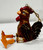 Key West Rooster with dangling legs