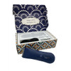 Peggy's Stitch Eraser Pro shown with open storage box and accessories