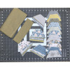 Our Town Hexies Quilt Kit fabrics and hexagon pieces on cutting mat
