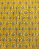 Modern Tyke mustard fabric with repeating gray arrow motifs