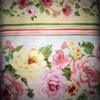 Savannah Rose floral border fabric with pink and yellow roses