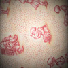 Savannah Rose cream fabric with vintage pink figure motifs