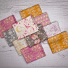 Sweet Baby Girl fat quarter bundle in pink, peach, gray, and nursery prints
