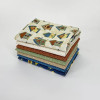 Folded Tan fat quarter fabric bundle